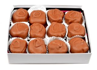 Each box contains crunchy cashews combined with caramel and covered in Swiss Milk Chocolate.  