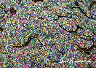 Dark Chocolate Nonpareils with pastel sprinkles add a touch of elegance to any celebration