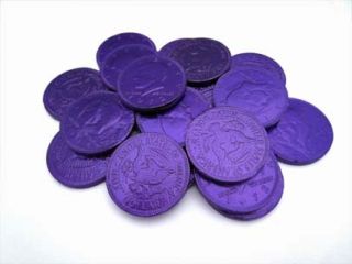 Purple is the color of royality and these purple chocolate coins deserve to be in a king's coffer!